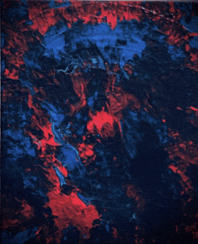 a painting of red and blue swirls on a blue background