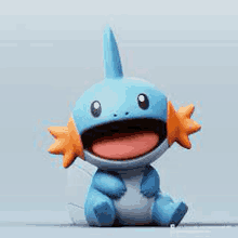 a 3d model of a pokemon figurine with its tongue out .