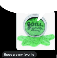 a jar of green dough is sitting on a table next to a text message that says those are my favorite .