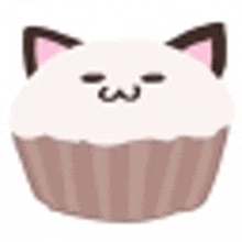 a cupcake with a cat face on it