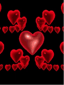 a glowing red heart is surrounded by smaller hearts