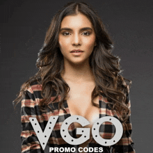 a woman in a plaid shirt stands in front of a sign that says promo codes