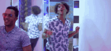 two men are dancing in front of a mirror and one of them is wearing sunglasses