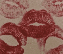 a close up of a woman 's lips with red lipstick on them