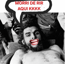 a black and white photo of a bearded man with a speech bubble that says morri de rir aqui kkk