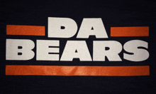 a black shirt that says da bears in white and orange