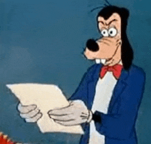 goofy is holding a piece of paper in his hands and wearing a tuxedo and bow tie .