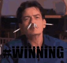 a man with cigarettes sticking out of his nose with the word winning in the background