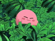 a pink cartoon character is sitting in a lush green forest