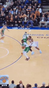 a basketball game is being played in madison square