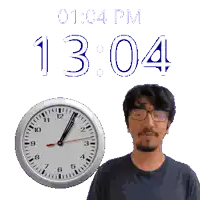 a man with glasses stands in front of a clock that reads 1304