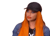 a woman with orange hair is wearing a hat and a denim jacket .