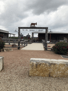 a sign with a lion on top of it that says fort texas station