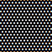 a seamless pattern of polka dots on a black background .