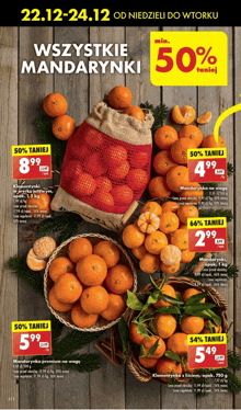 an advertisement for mandarins with a 50 % off sign