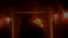 a blurred image of a person in a dark room with lanterns hanging from the ceiling