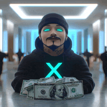 a man wearing a black hoodie with an x on it is holding a stack of 100 dollar bills