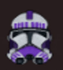 a purple and white helmet with goggles on a dark background .