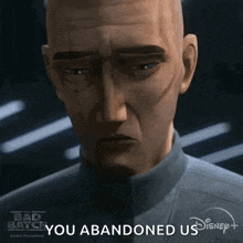 a close up of a man 's face with the words `` you abandoned us '' on it .