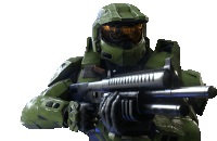 a man in a green helmet is holding a large gun