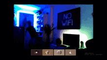 a computer screen shows a room with a no wifi sign on the wall