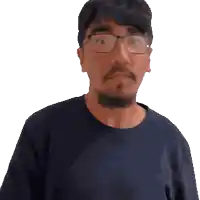 a man wearing glasses and a blue shirt looks surprised