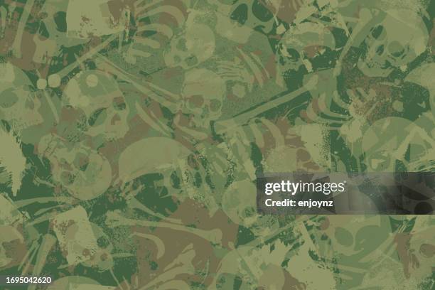 seamless camouflaged skulls and bones pattern - human figure green background stock illustrations