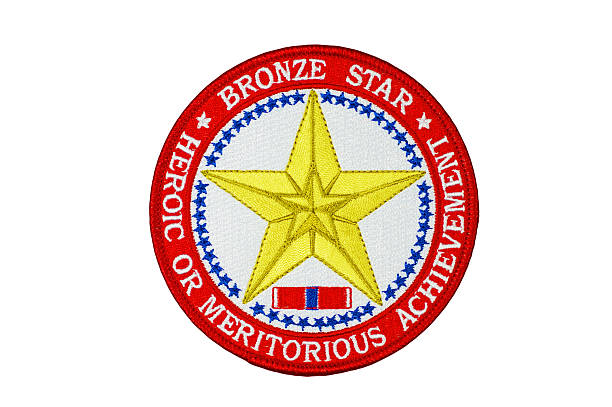 Bronze Star Patch "Isolated on white with clipping path.This patch is worn by U.S. military recipients of the bronze star medal. The Bronze Star Medal is a United States Armed Forces individual military decoration which may be awarded for bravery, acts of merit, or meritorious service. When awarded for bravery, it is the fourth-highest combat award of the U.S. Armed Forces." us air force insignia stock pictures, royalty-free photos & images