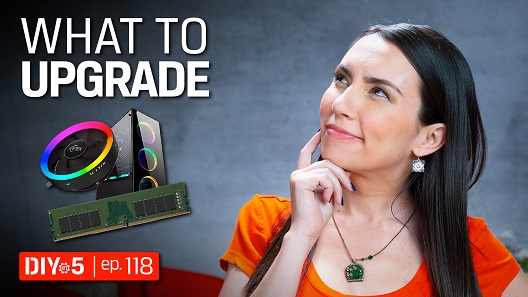 Trisha looking at an RGB PC, fan, DRAM module