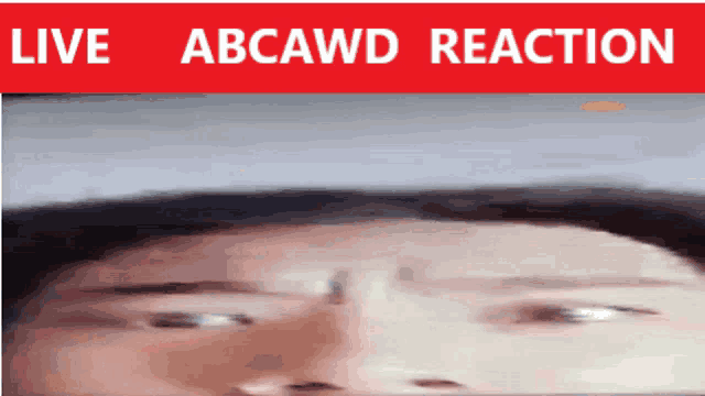 a close up of a person 's face with the words live abcawd reaction