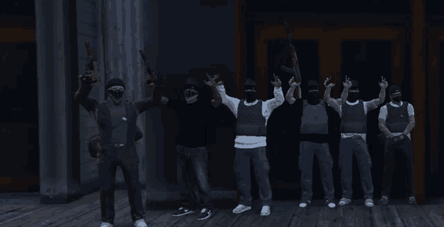 a group of men wearing masks and holding guns are posing for a picture