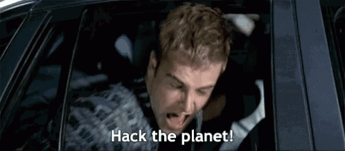 a man is screaming in a car and saying `` hack the planet '' .