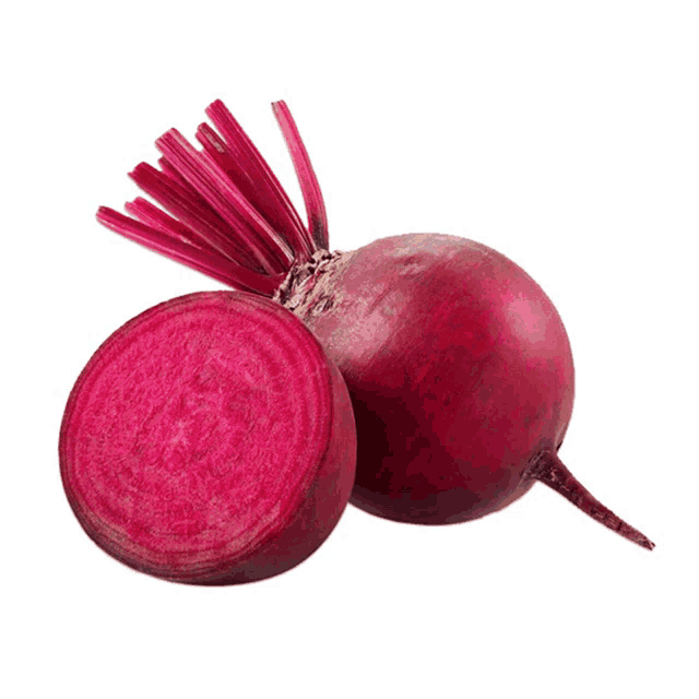 a whole beet and a half beet on a white surface