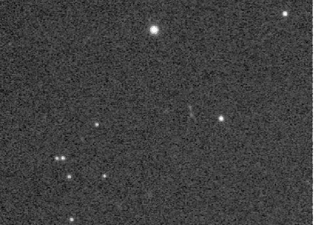 a black and white image of a starry sky