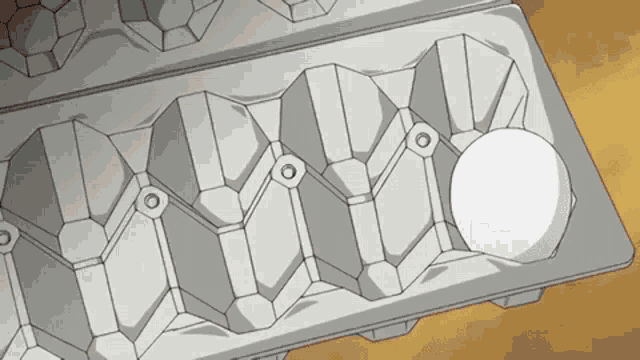 a carton of eggs with a white egg in the center