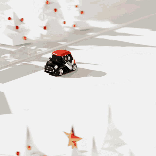 a black toy car with a red top is driving past a snowman with a gift