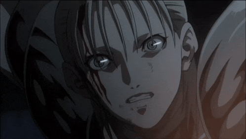 a close up of a woman 's face with a shadow on her face