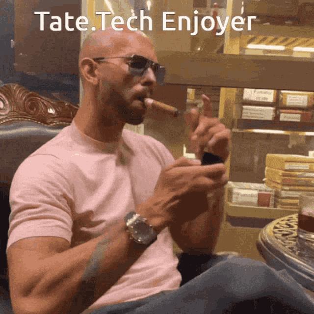 a man smoking a cigar with the words " tate tech enjoyer " below him