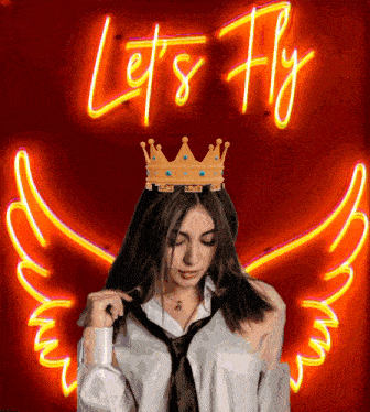a woman with a crown on her head stands in front of a let 's fly neon sign