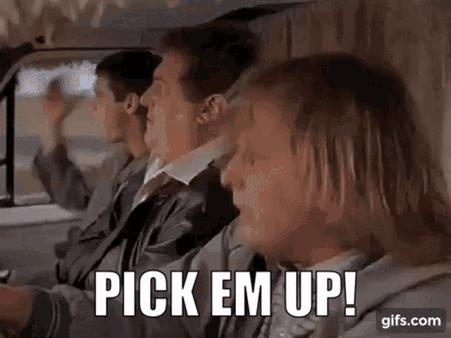 a group of people are sitting in a car and one of them is saying pick em up !