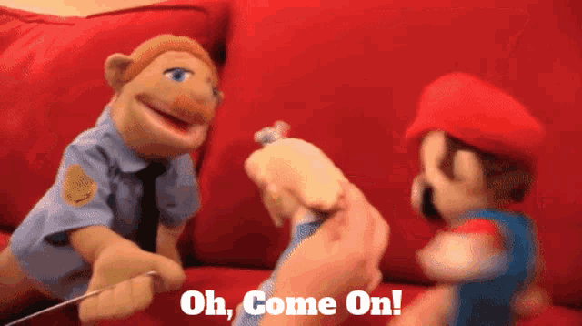 a mario and a police puppet are on a red couch with the words oh come on above them