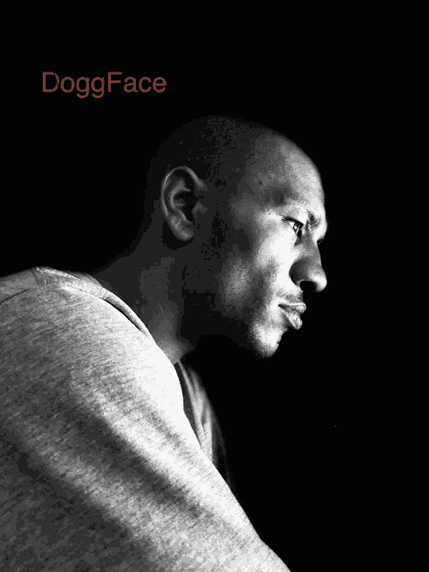 a black and white photo of a man with the words doggface on the top