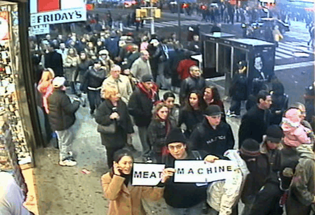 a crowd of people are standing in front of a friday 's store