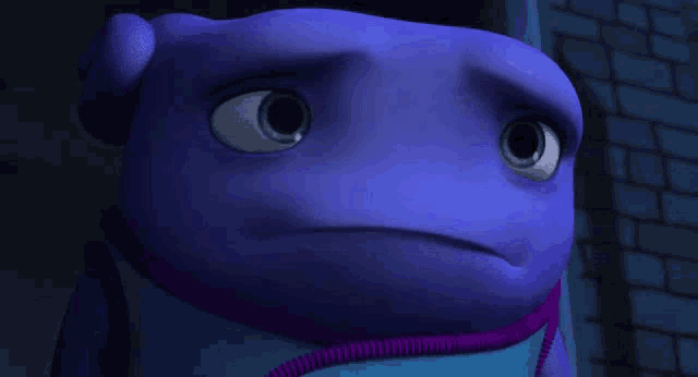 a close up of a purple cartoon character with a sad look on its face