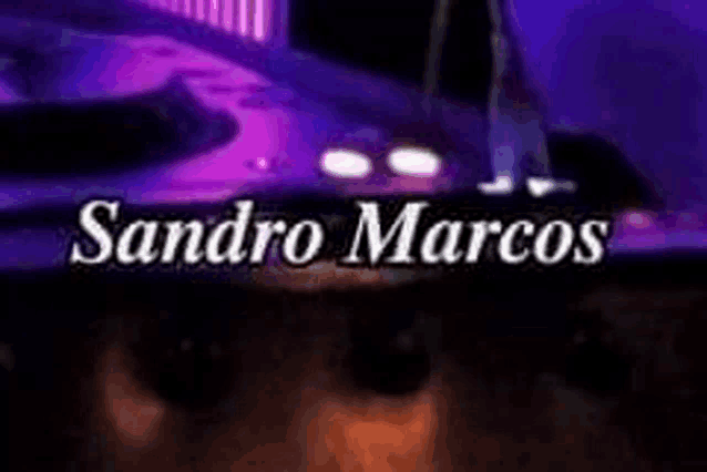 the name sandro marcos is on a purple background