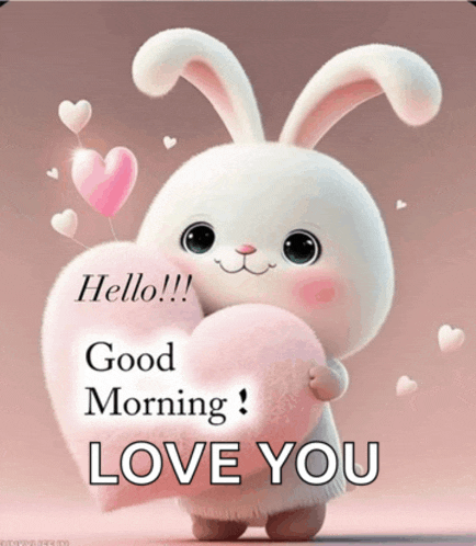 a stuffed bunny is holding a pink heart and says good morning i love you