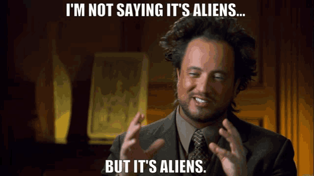 a man in a suit and tie says " i 'm not saying it 's aliens "