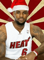 basketball player wearing a santa hat and a heat jersey