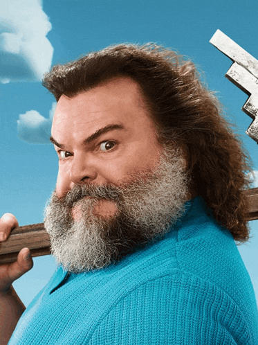 a man with a beard and long hair is holding a sword