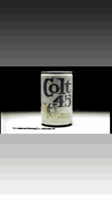 a can of colt 45 malt liquor is on a table